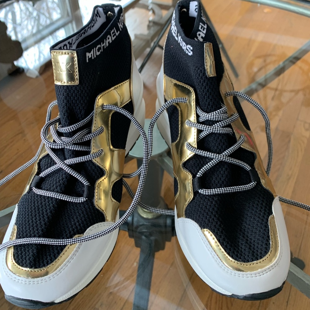 Michael Kors designer sneakers. White black and gold design . Size 8 1/2